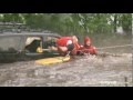 Dramatic rescue: girl saved from car in Iowa floods