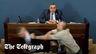 Georgian MP punched in the face as parliament descends into mass brawl