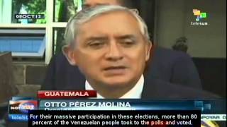 Otto Perez Molina congratulates Hugo Chavez