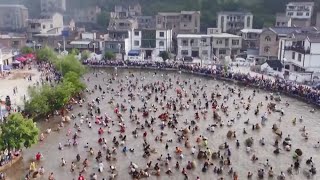 Aerial China: Folk fishing festival in SW China| CCTV English