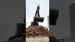 Loading a truck with a Yanmar Vio55 excavator