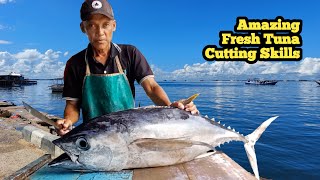 Great Skills! Uncle Bahar Cut and peel the skin of fresh yellowfin tuna to make tuna satay