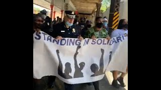 Police brutality protesters march with officials in New Jersey