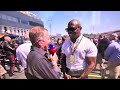 Terry Crews flexes his pecks at the Hungarian GP