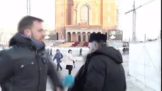 Reporter pushes priest in Romania