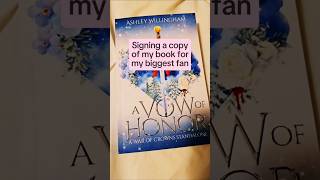 Signing a copy of my clean fantasy romance book for my biggest fan #fantasyromancebooks