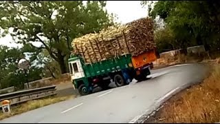 HEAVY LOAD Risky Turn SUGARCANE LORRY - part 2 - TURNING ON WET RAINY ROAD - DANGEROUS