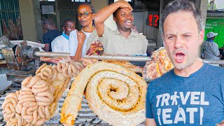 Insane Slum Feast!! Eating Rocks and Crocodile in Nairobi, Kenya!