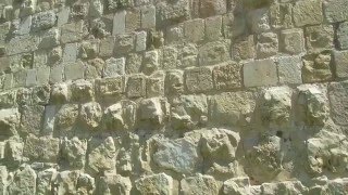 Legio X Fretensis (a Roman legion) - a stone in the old city wall. Jerusalem 2014