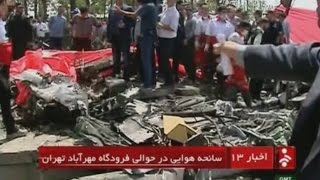 Plane crashes near Tehran's Mehrabad airport, killing dozens