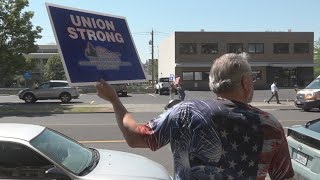 Spokane employees picket in dispute over public negotiations