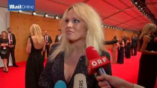 Pamela Anderson sparkles in fitted mini dress at Bambi awards
