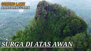 PENDAKIAN MENUJU GUNUNG LAWE SURGA DI ATAS AWAN YANG MEMUKAU