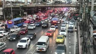 Ambulance on a heavy traffic afternoon in Thailand.