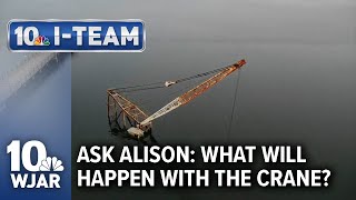 Why is the sunken crane still in the Providence River?