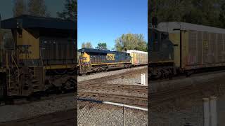 CSX SD70MAC and ES44AH westbound at Marion, OH. Note the Drone above!!