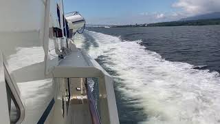 Tollycraft 61 at cruise with 10 year old skipper..