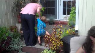 2010.8.22 - Playing outside with Grandma Scherer 1 of 2