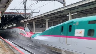 Japan's Shinkansen bullet train passes through the station at 300 km/h