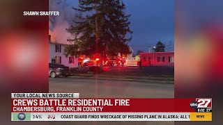 Crews battle residential fire