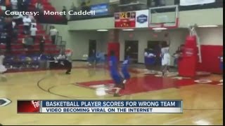 Basketball player scores winning basket for wrong team