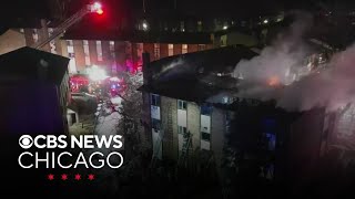 Flames shoot through roof of apartment complex near Arlington Heights, Illinois