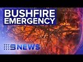 Firefighters battle hundreds of blazes in two states as temperatures soar | Nine News Australia