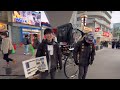 a 60 year old funky bachelor from japan climbs the tsutenkaku observation deck in osaka