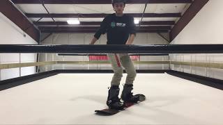 Brandon snowboarding inside