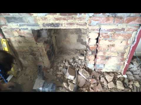 Breakout and widening of 1950's fireplace, installation of Charnwood C5 Breakout and widening of 1950's fireplace, installation of Charnwood C5