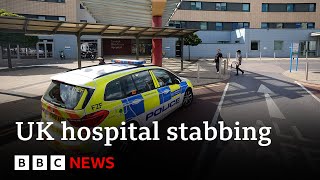 Man arrested at London hospital after two people stabbed - BBC News