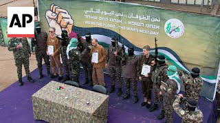 Israeli hostages Eli Sharabi, Ohad Ben Ami and Or Levy handed over by Hamas-led militants in Gaza