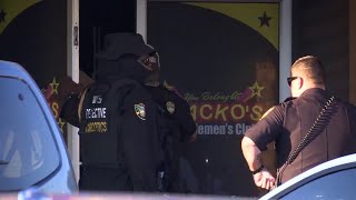 Police officers raid Wacko's Jacksonville on Emerson Street