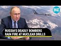 Russia's deadly TU-95 bombers fire cruise missiles as Putin watches nuclear drills | Watch