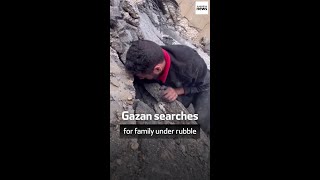 Gazan searches for family under rubble