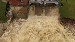 Smallwood Lake Dam overflowing.