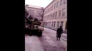 Russian terrorists tuck tanks in between office buildings