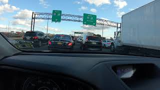 NJ Turnpike13a Toll booth merge during rush hour.