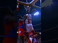 Michael Jordan dunks over Manute Bol