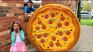 Heidi Plays with Giant Inflatable Pizza Toy for Children