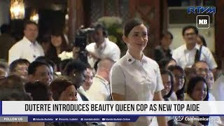 Duterte introduces beauty queen cop as new top aide