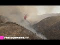 planes make drops over brentwood mandeville canyon fire in pacific palisades los angeles