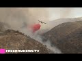 planes make drops over brentwood mandeville canyon fire in pacific palisades los angeles