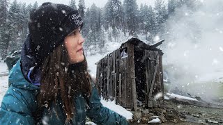 snowstorm camping in abandoned shack