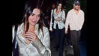 Kendall Jenner looks chic in a silk blouse for date night with beau Bad Bunny - after he confessed