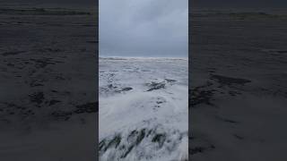 Huge foamy wave rushing up the beach. #ocean #waves #nature