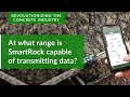 At what range is SmartRock® capable of transmitting data?