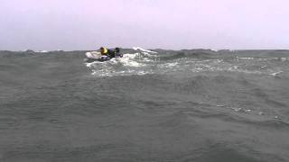 2 Inflatable boats in big swells.