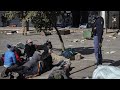 South Africans react to widespread looting and unrest across country