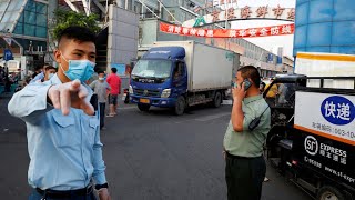 Beijing reports more new Covid-19 cases as WHO warns of cause for 'concern'